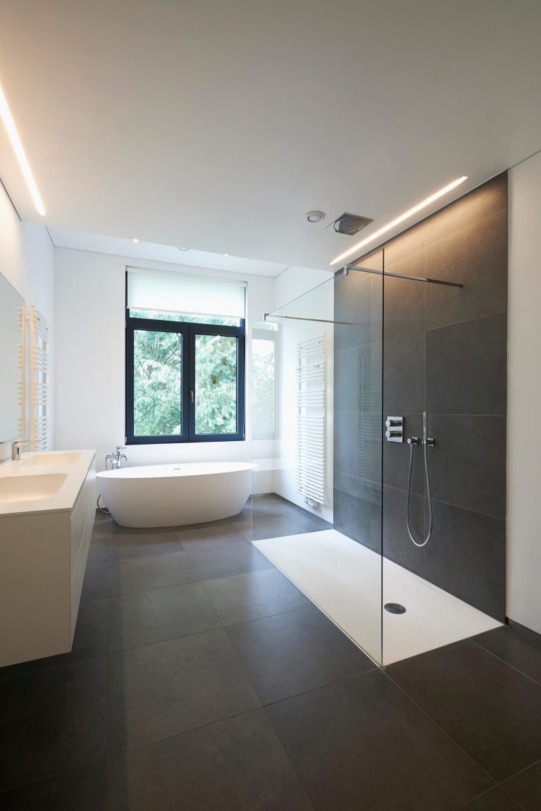 Modern freestanding tub with matte black faucet in bathroom remodel Cupertino